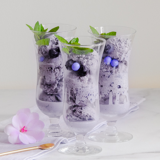 Three glasses with blueberry ice cream