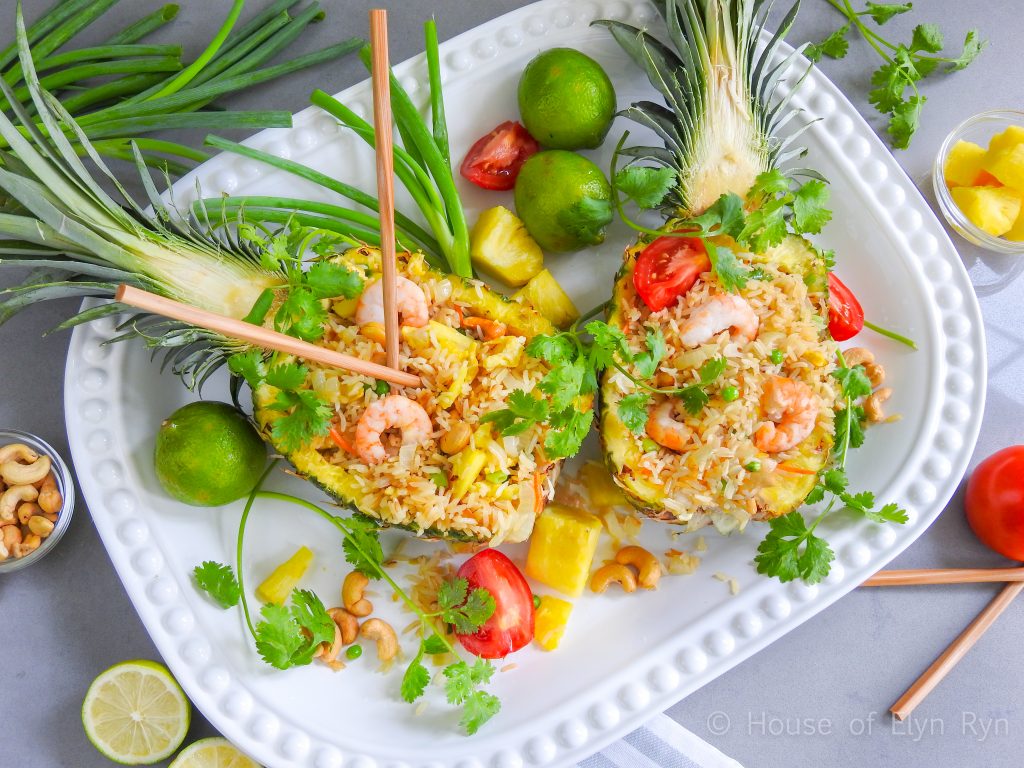 Rice served in pineapple shells on a large platter