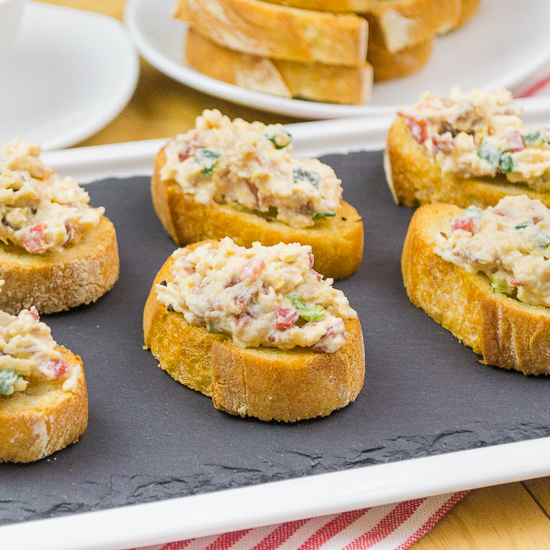 Bacon and Pimento Cheese Crostini on a tray