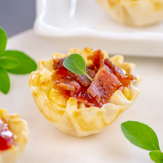 Closeup photo of a Cheese & Hot Pepper Jelly Bite