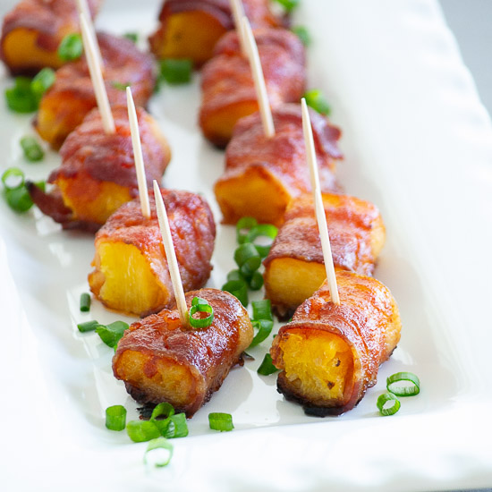 Pineapple chunks wrapped in bacon