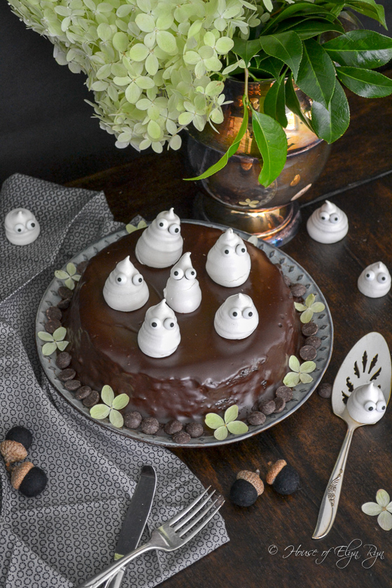 Table set with chocolate cake