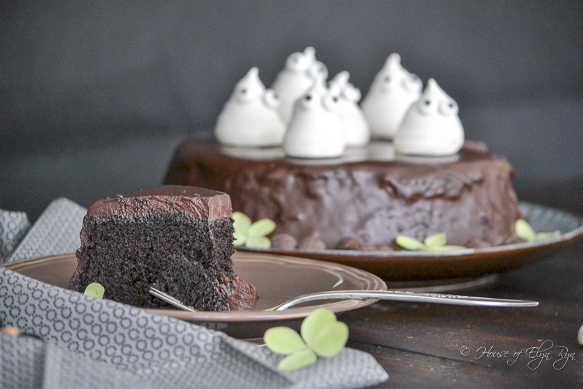 Cake slice with full cake in background