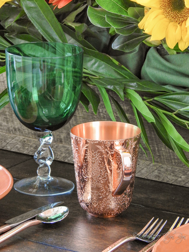 Green goblet and copper mug