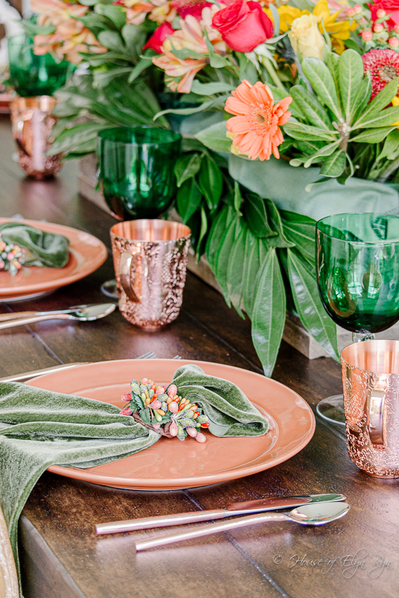 Place setting with green velvet napkin