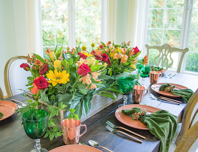Vibrant fall flowers in a reclaimed wood box