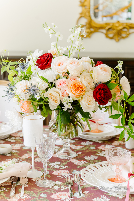 A romantic fall table with pink flowers