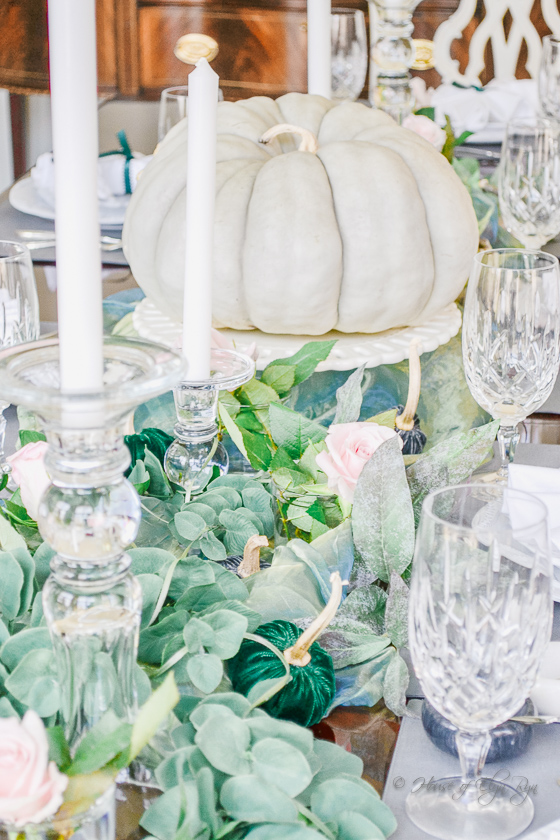 Fall table with a sage colored pumpkin centerpiece