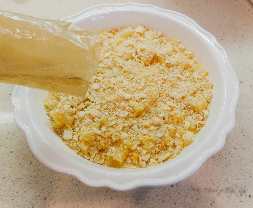 Crushed are crackers added to baking dish