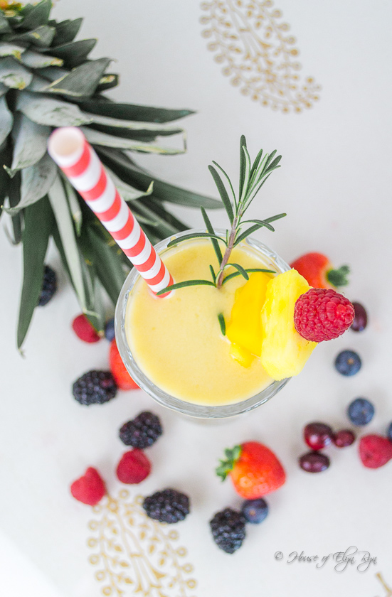 A glass of pineapple mango smoothie