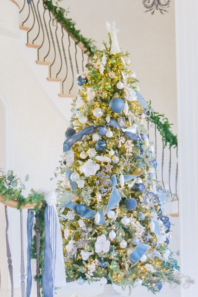 Christmas tree decorated in a blue woodland style