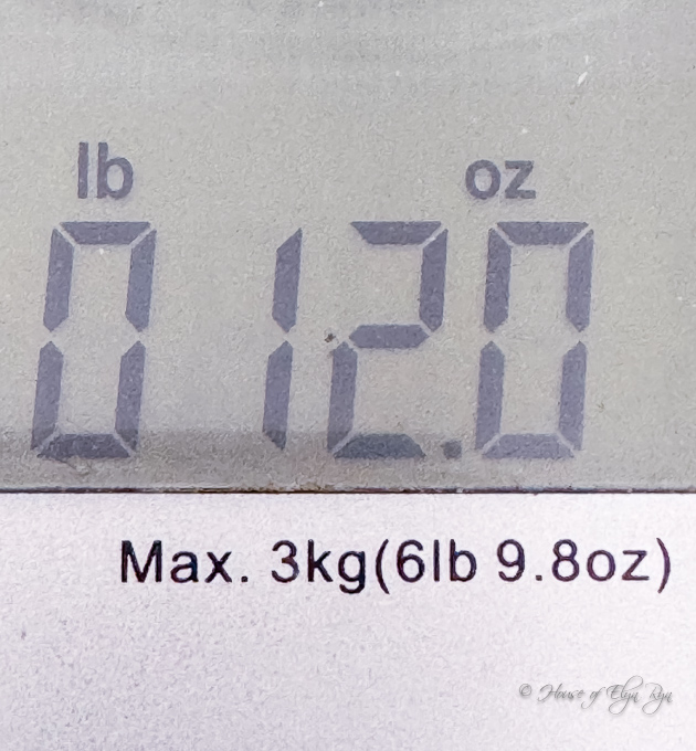 Food scale showing the weight of the chocolate