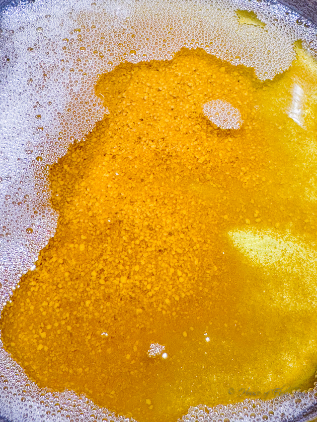 Light brown color underneath bubbles