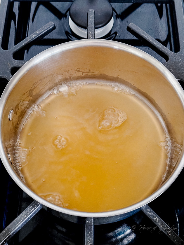 Cider starting to boil in a pan