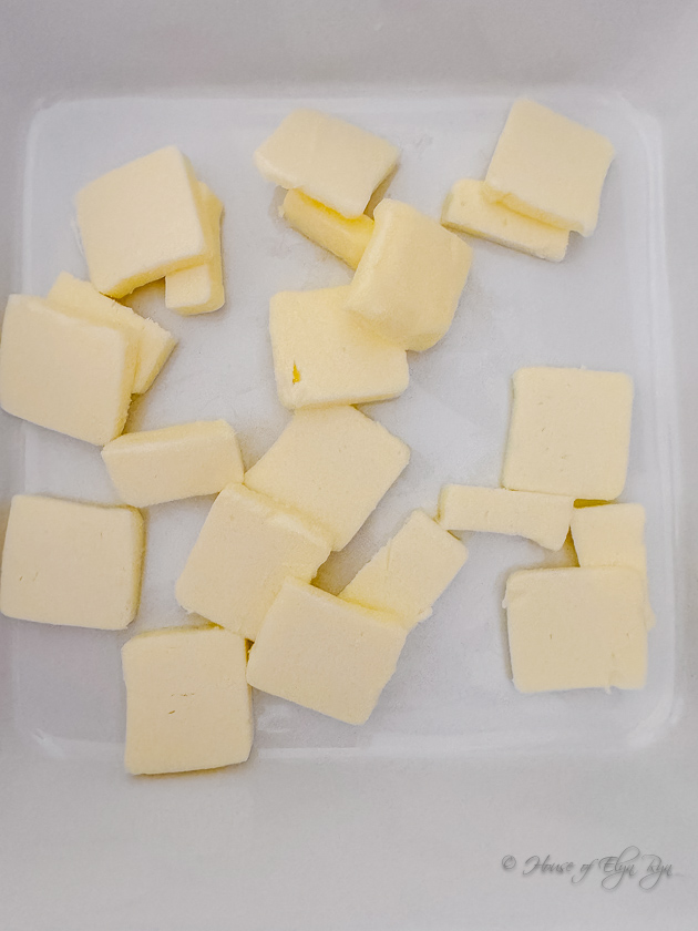 Small pieces of butter for melting