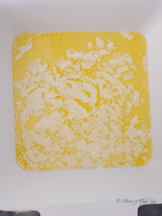Butter melted in the baking dish