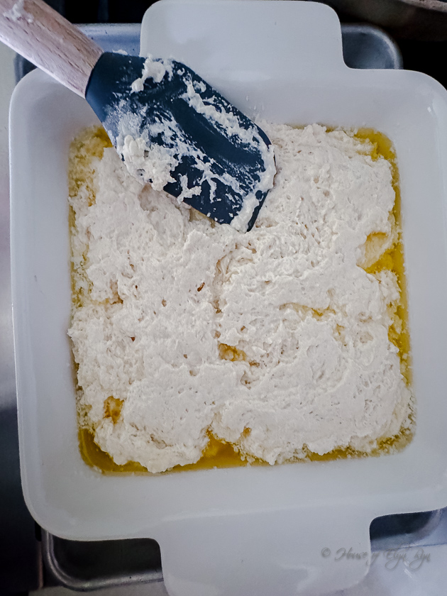 Batter added to the melted butter