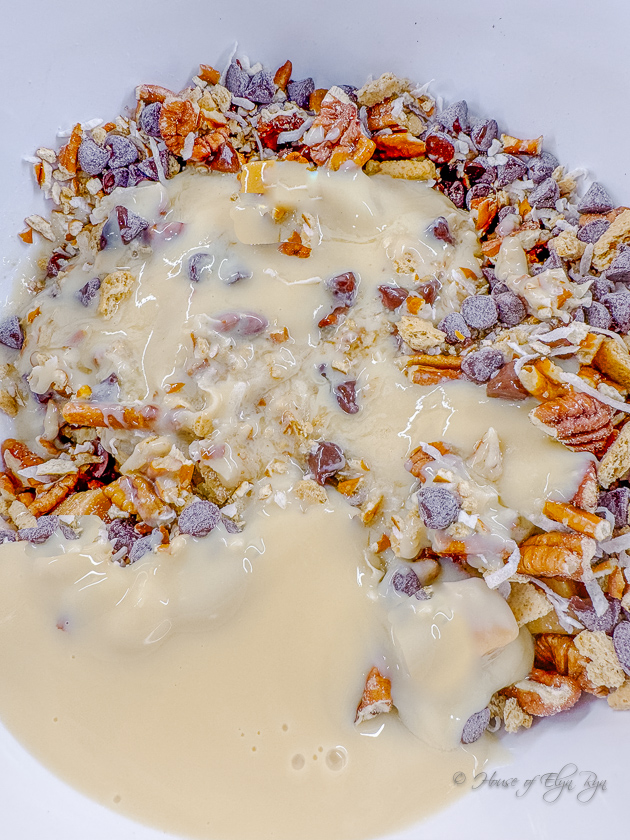 Add condensed milk and butter to the dry ingredients.